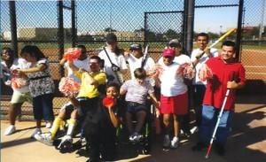 Youth baseball team gathered on field